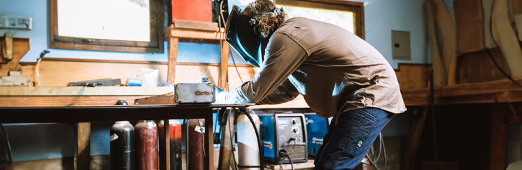 Guy working in the FXD long sleeve work shirt