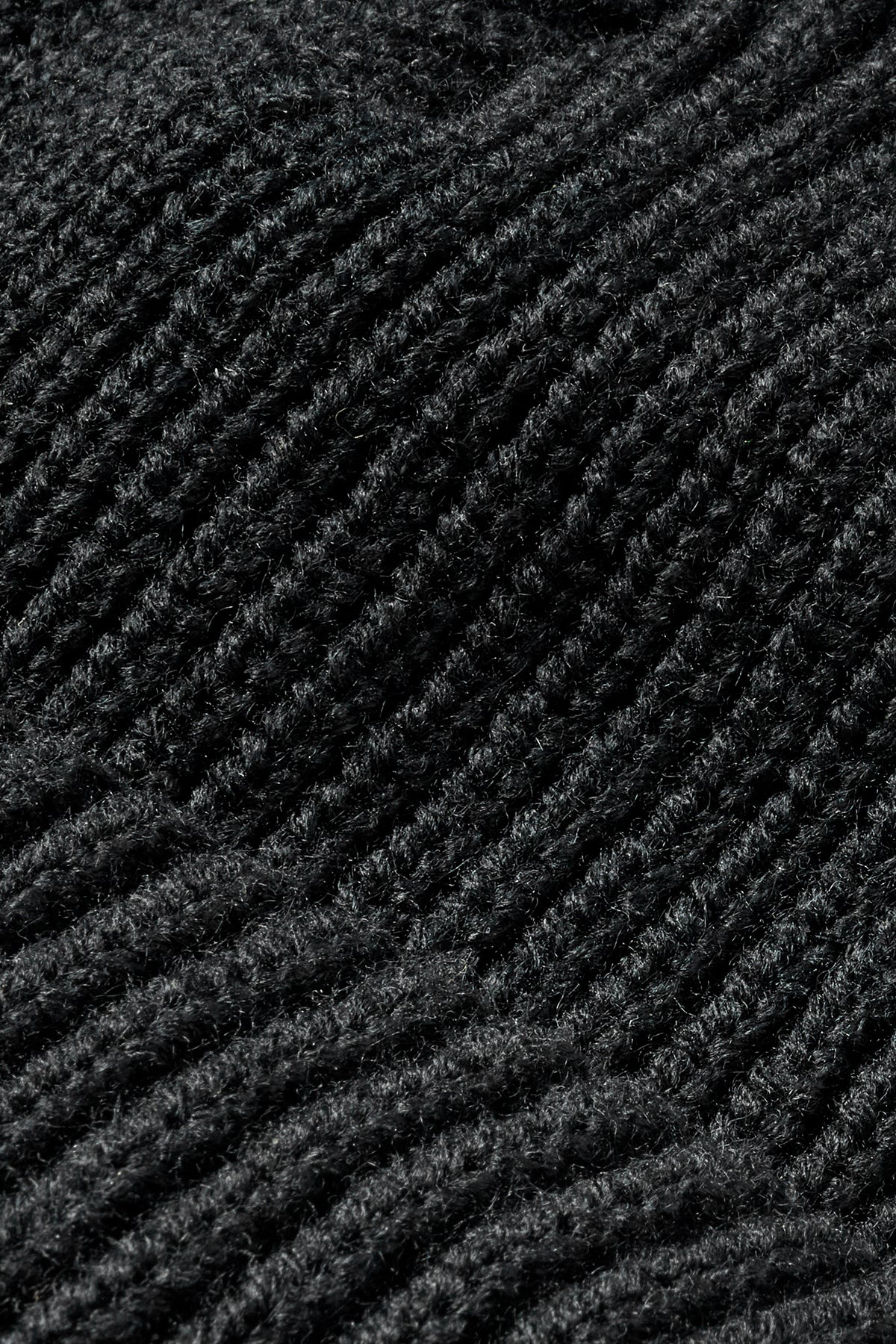 Close up of black 1x1 knit fabric texture used in the FXD CP-10 classic work beanie