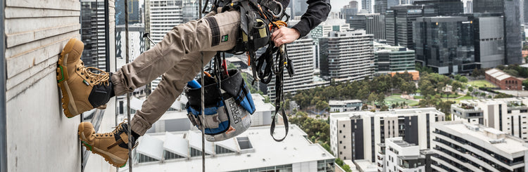 Person working in WP4 cuffed work pants