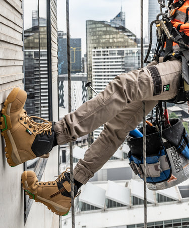 Person working in WP4 cuffed work pants